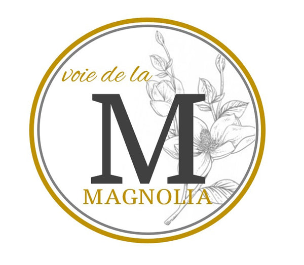 Voie De La Magnolia Florist & Specialty logo